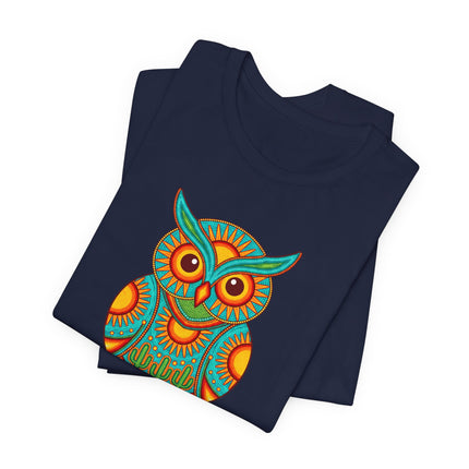 Vibrant Huichol owl graphic tee featuring Mexican folk art, bohemian desert motifs, and colorful patterns.