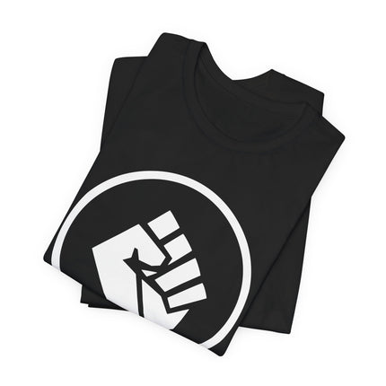 Black t-shirt featuring a white raised fist symbol, representing solidarity and resistance.