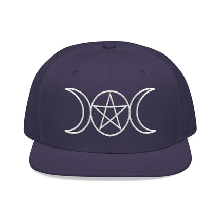 Dark blue snapback cap featuring embroidered triple moon and pentagram design.