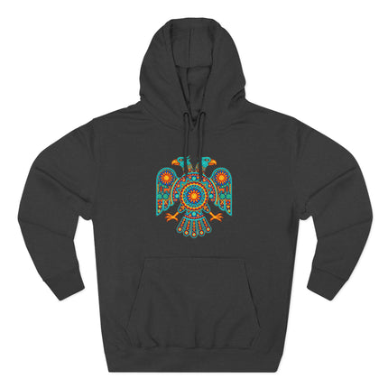 Vibrant Huichol two-headed eagle graphic on a black pullover hoodie. Mexican folk art and spiritual symbolism.