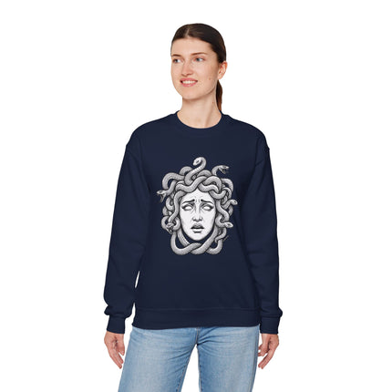 Medusa head graphic on a navy sweatshirt. Features a distressed portrait with snakes for hair, referencing Greek mythology.