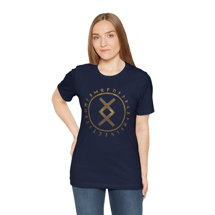 Navy t-shirt featuring a golden circular design of Norse Futhark runes and the Inguz symbol.