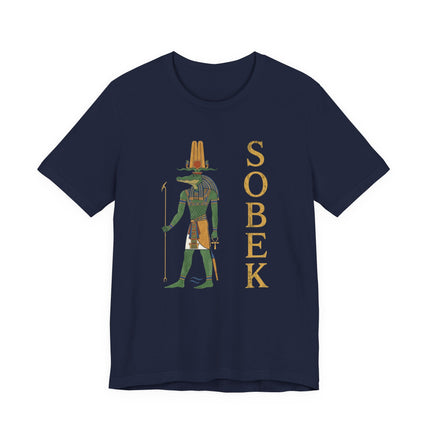 Sobek Egyptian crocodile god t-shirt featuring ancient mythology art and gold lettering.