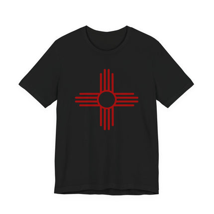 Black t-shirt featuring the red Zia Sun Symbol, a Native American Southwest graphic tee.