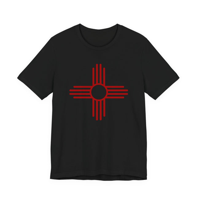Black t-shirt featuring the red Zia Sun Symbol, a Native American Southwest graphic tee.