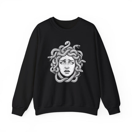 Medusa head graphic featuring coiled snakes for hair, inspired by Greek mythology.