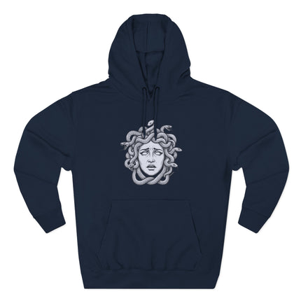 Medusa head graphic featuring coiled snakes, a Greek mythology gorgon design.