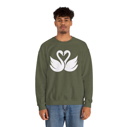 Swans forming a heart graphic on an olive green romantic couple sweatshirt.