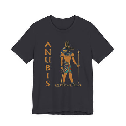 Anubis Egyptian god illustration on a t-shirt. Features the jackal-headed deity and vertical 'ANUBIS' text.