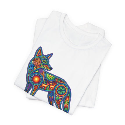 Vibrant Huichol art coyote graphic tee featuring Mexican folk art and geometric tribal patterns.
