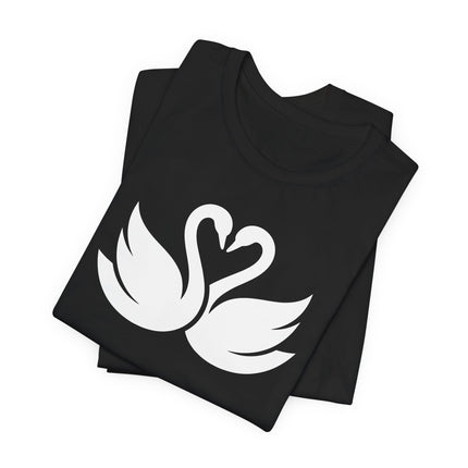 Swans forming a heart graphic on a black t-shirt, symbolizing love and romance.