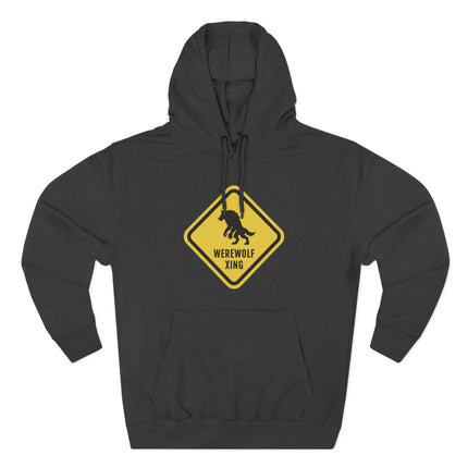 Black hoodie with a yellow warning sign graphic of a werewolf and "Werewolf Xing.