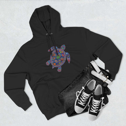 Mexican folk art turtle hoodie with vibrant Huichol tribal design.