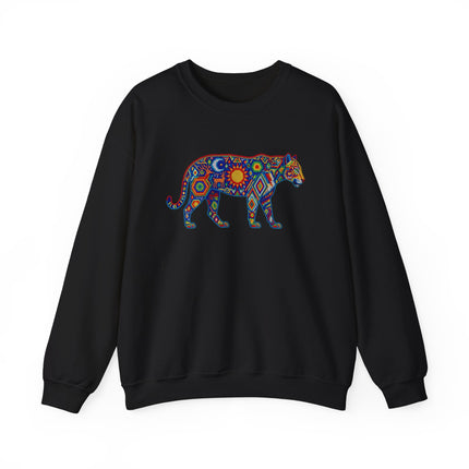 Colorful tribal jaguar art graphic featuring geometric Huichol-style design on a black sweatshirt.