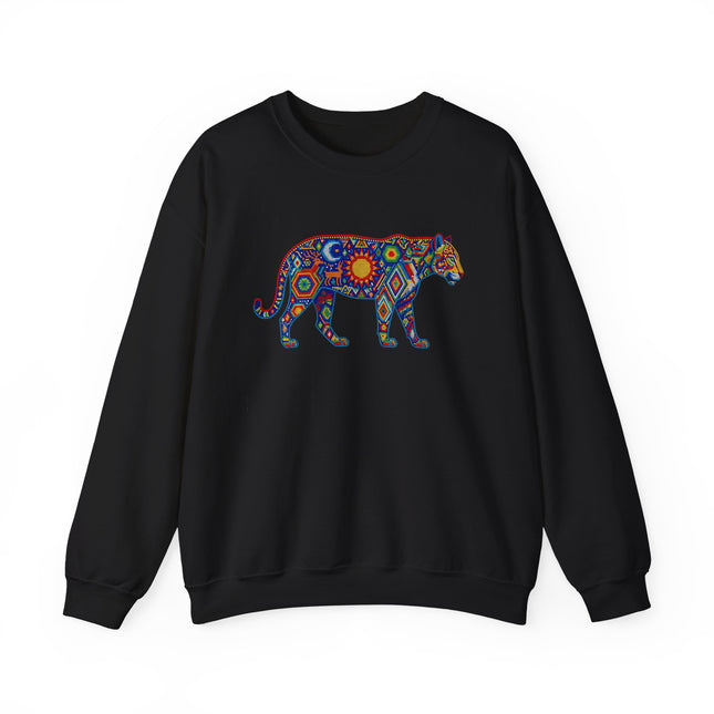 Colorful tribal jaguar art graphic featuring geometric Huichol-style design on a black sweatshirt.