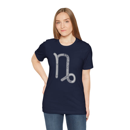 Capricorn zodiac sign graphic tee featuring an intricate celestial symbol.