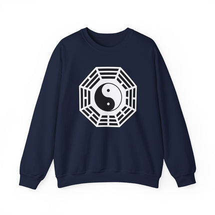 Navy pullover featuring a stylized Yin Yang and Bagua symbol graphic, representing Eastern philosophy.
