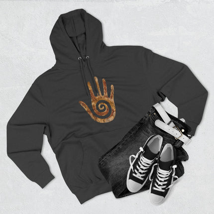 Black pullover hoodie featuring the orange Hopi healing hand and spiral protection symbol.