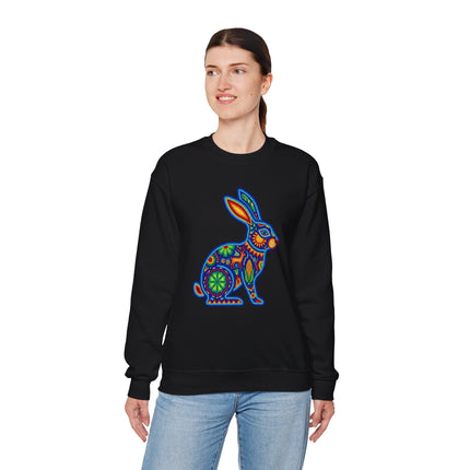 Huichol art rabbit graphic on black sweatshirt, featuring colorful Mexican folk design.