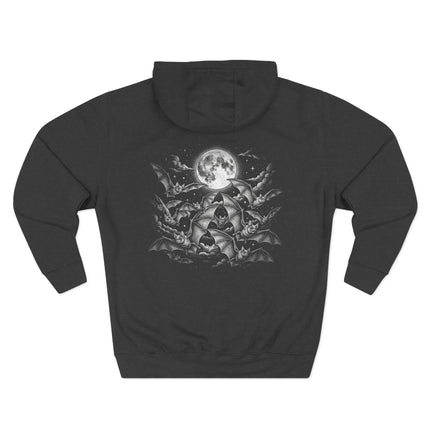 Mystical gothic design featuring bats flying around a full moon and celestial elements.