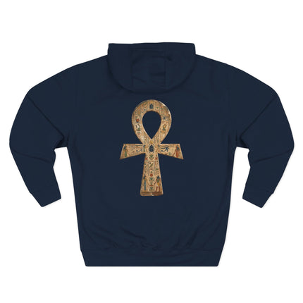 Detailed Ankh hieroglyph symbol on a dark blue hoodie, representing ancient Egyptian eternal life.