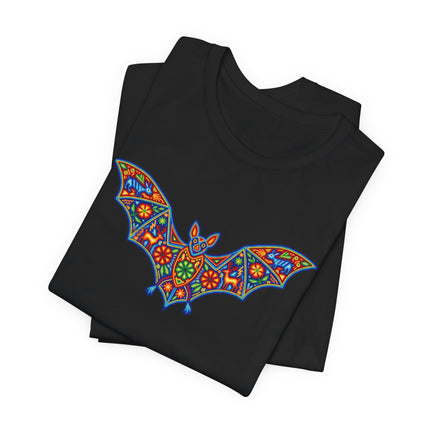 Vibrant Huichol Mexican folk art bat graphic on a black t-shirt, featuring indigenous style print.