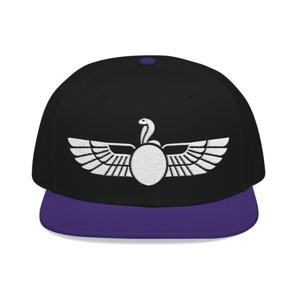 Black snapback hat with white embroidered Egyptian winged Uraeus sun disk symbol.