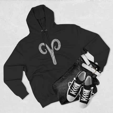 Tribal Aries zodiac symbol graphic on a black pullover hoodie.