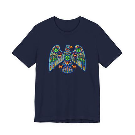 Colorful Huichol-style eagle graphic tee featuring vibrant Mexican indigenous folk art design.