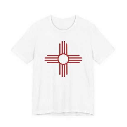 Red Zia Sun Symbol graphic on a white t-shirt. Native American Southwest cultural design.