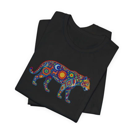 Vibrant Huichol jaguar mosaic art tee featuring cosmic sun and moon symbols.