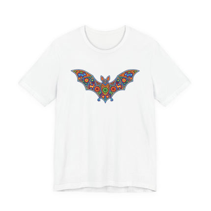 Vibrant Mexican folk art bat graphic on a white t-shirt.