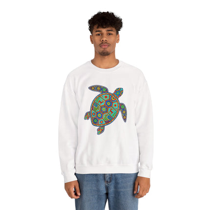 Vibrant geometric turtle graphic in Mexican folk art style on a white sweatshirt.