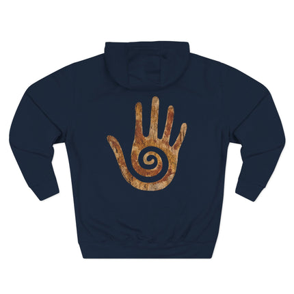 Dark hoodie featuring a distressed Hopi healing hand symbol with a spiral design.