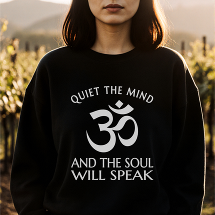 Om symbol sweatshirt with "Quiet the Mind, And the Soul Will Speak" spiritual message.