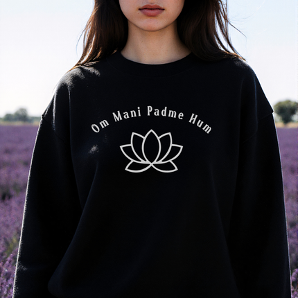 Black unisex sweatshirt featuring the Om Mani Padme Hum mantra and a minimalist lotus design.