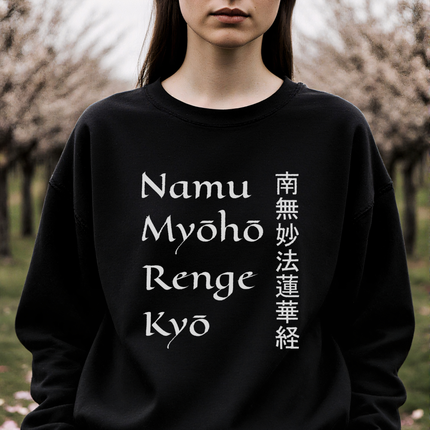 Black sweatshirt featuring the Namu Myoho Renge Kyo Buddhist mantra and Kanji script.