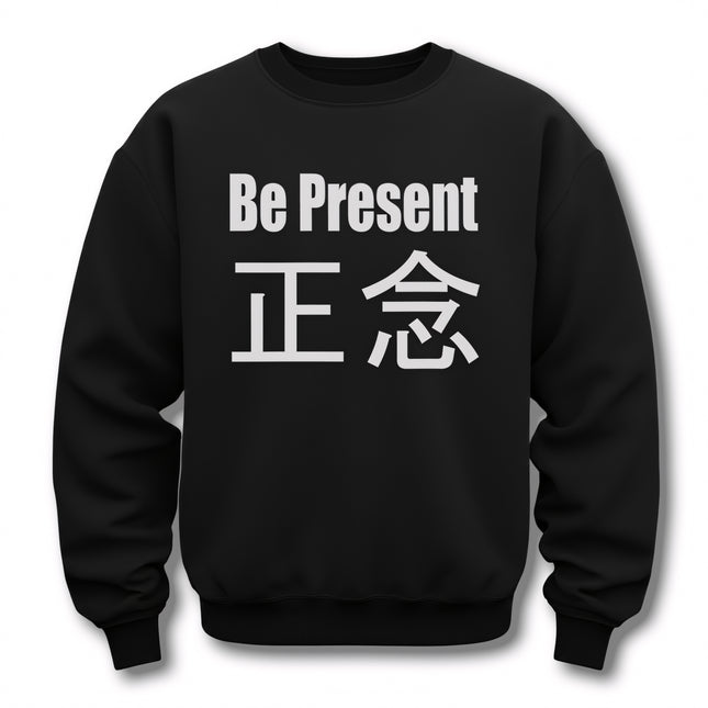 Black unisex pullover featuring "Be Present" and the Kanji 正念 for mindfulness and Zen apparel.