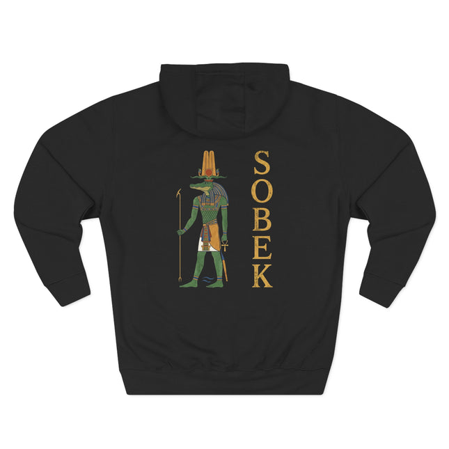 Sobek, the Egyptian crocodile god, graphic print on a black hoodie featuring the deity and "SOBEK" text.