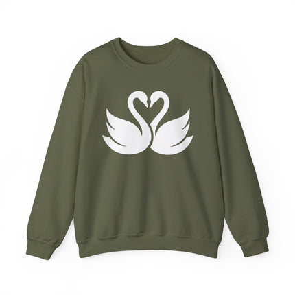 Minimalist graphic of swans forming a heart on a green pullover sweatshirt.