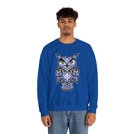 Blue sweatshirt featuring a Pacific Northwest style owl formline art design.