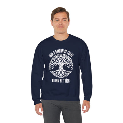 Celtic Tree of Life knot design on a sweatshirt with Irish Gaelic text, spiritual wear.