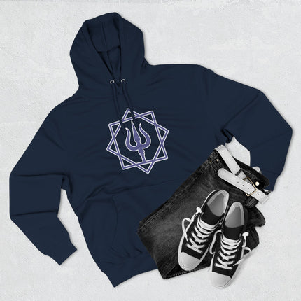 Geometric trishula symbol on a dark hoodie, representing Shiva and Hindu spirituality.
