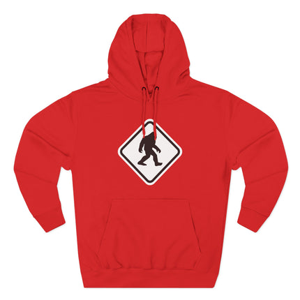 Bigfoot crossing warning sign graphic on a red pullover hoodie.