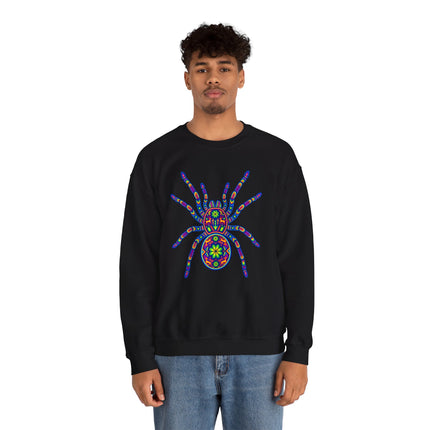 Vibrant folk art tarantula graphic on black sweatshirt, inspired by Huichol Mexican style.