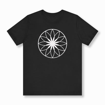 White sacred geometry lotus mandala graphic on a black t-shirt.