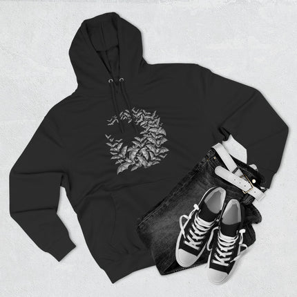 Circular gothic bat swarm wreath graphic on a black pullover hoodie.