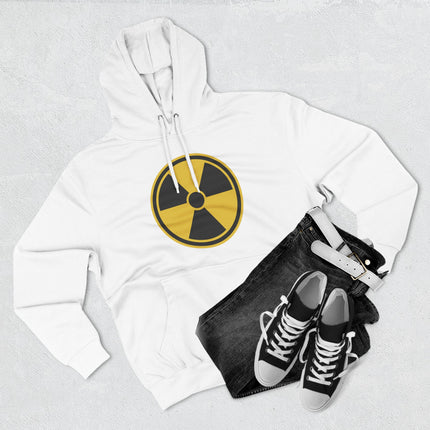 White hoodie featuring a bold yellow radioactive hazard symbol print. Nuclear warning graphic apparel.