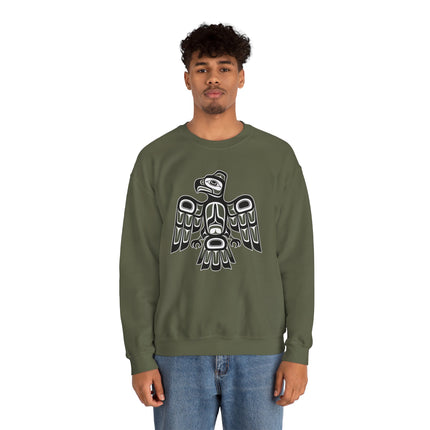 Pacific Northwest raven formline art graphic on a dark green pullover sweatshirt.