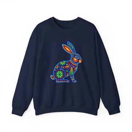 Vibrant Huichol art beaded rabbit graphic on a navy pullover sweatshirt.